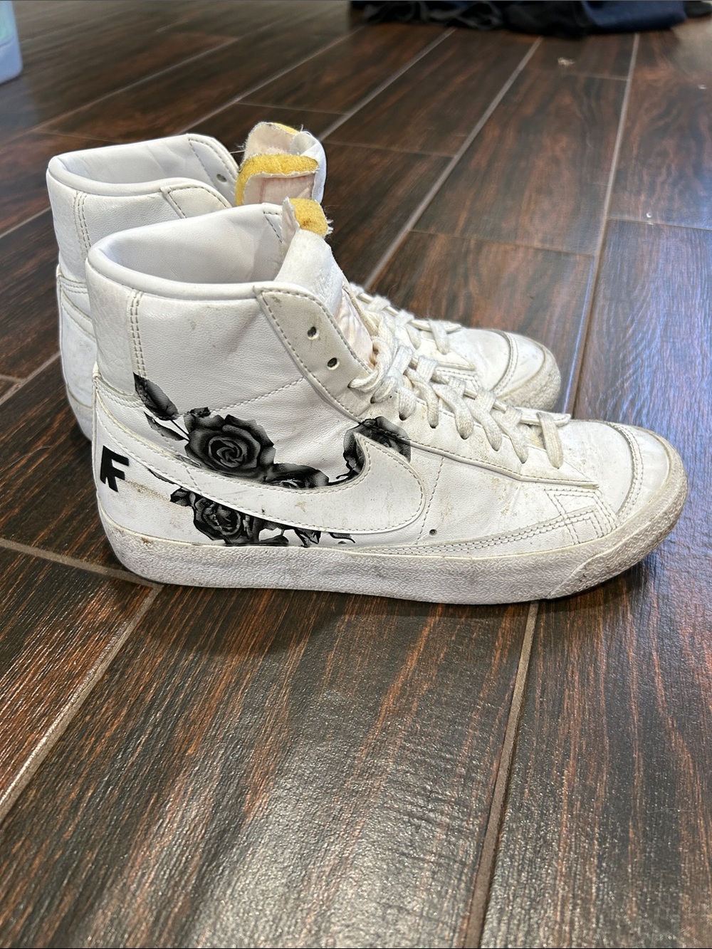 Nike White High-Top Sneakers with Black Rose Graphic